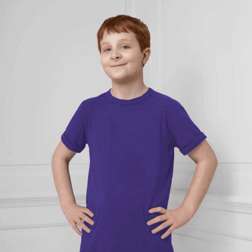 An autistic boy wearing a fidget t-shirt with built in popits, in the purple brand colour of Caudwell Children