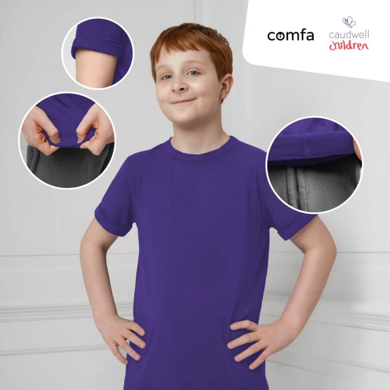 autistic boy wearing comfa clothing fidget-t in caudwell children collaboration colour purple